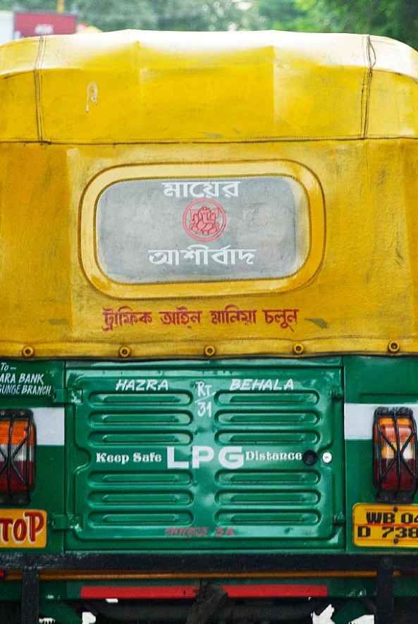 'Mother's Blessings' written on the back of an Auto in Kolkata