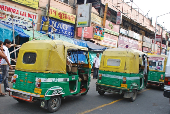 Autos stuck in a traffic jam in Gariahat - the famous market area in Kolkata