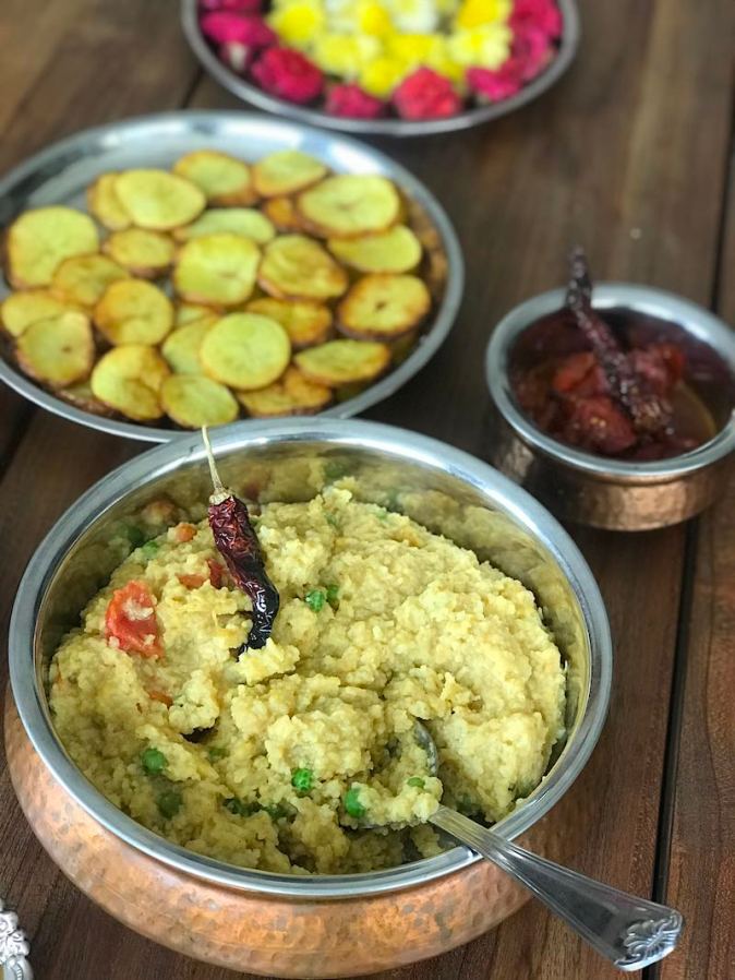 Khichuri and Aloo bhaja cooked in the festive way