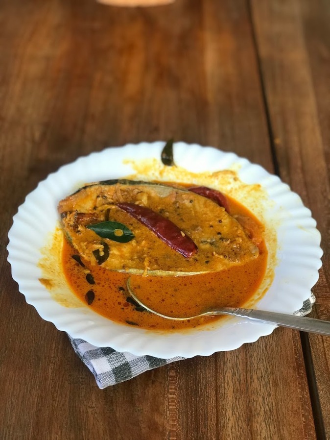 Meen Kuzhambu / Kulambu, fish gravy cooked in tamarind , coconut milk and spices