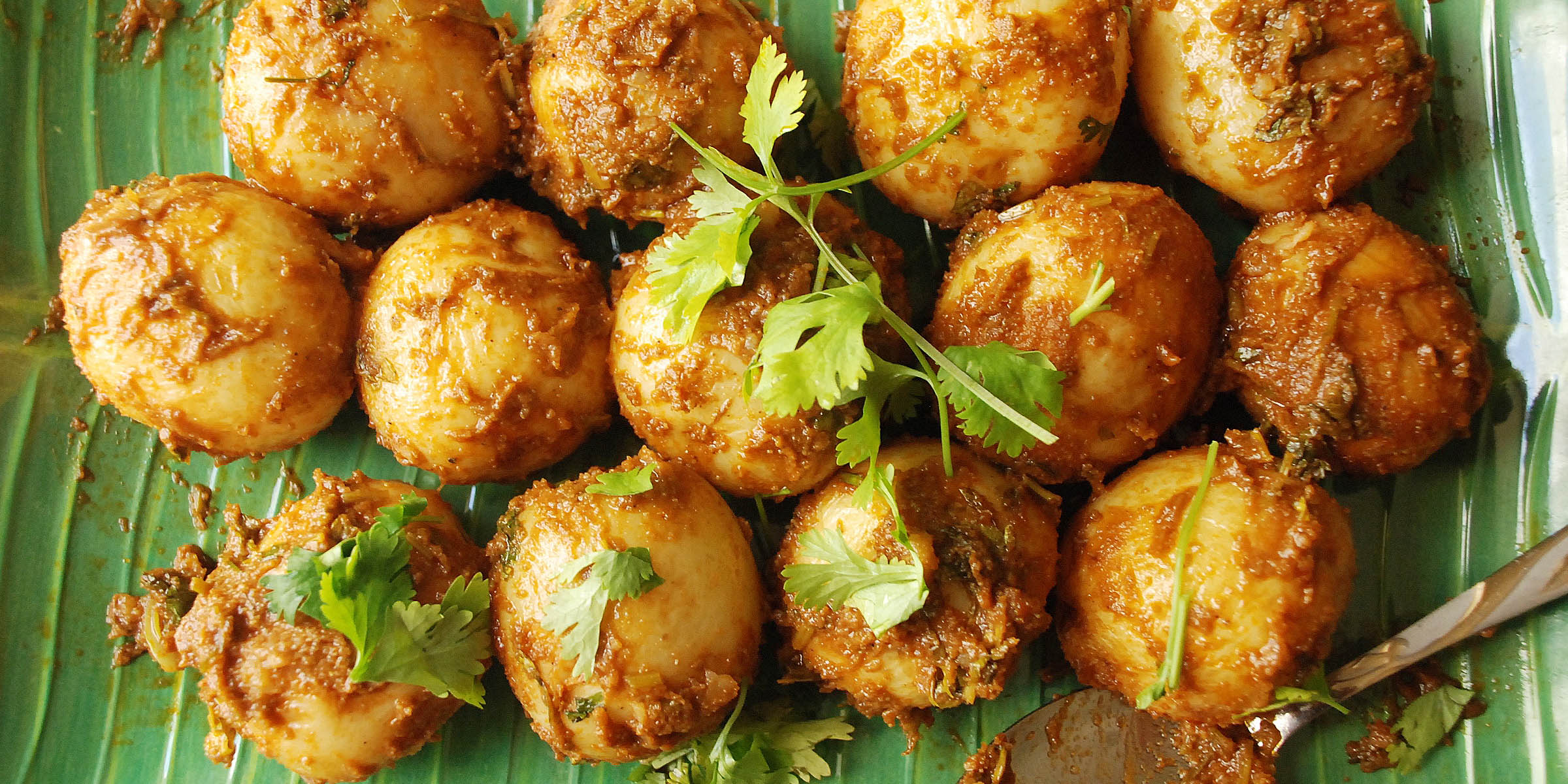 Kolkata style spicy Aloor Dum with baby potatoes