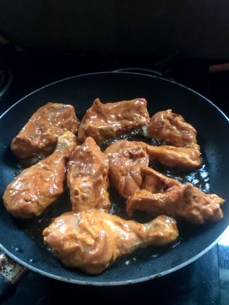 Frying pieces of Chicken 65