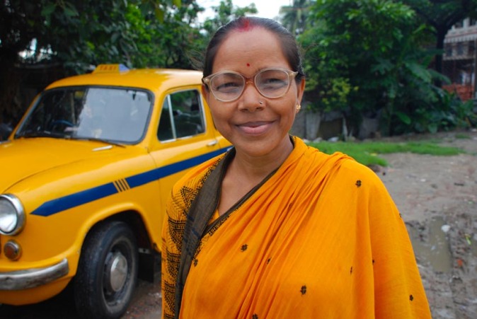 Lady wearing yellow sari