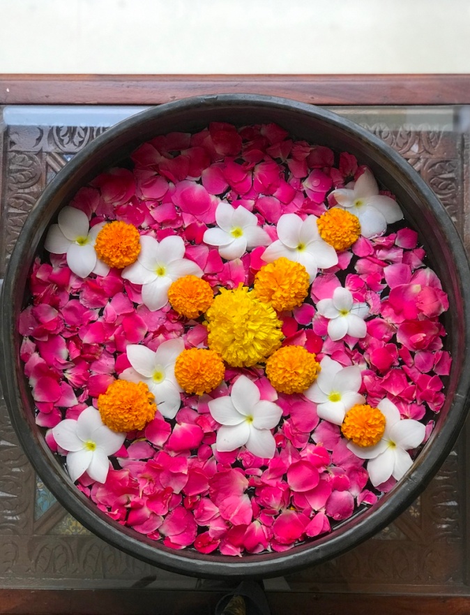 Flower arrangement in a traditional urli